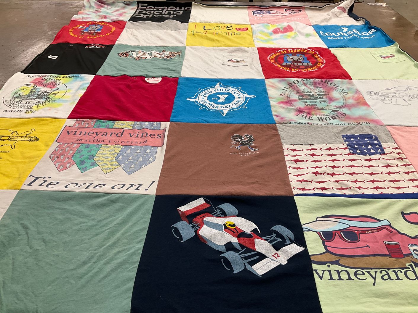 T-shirt quilt with racing, railroad themes by Wendy from NC