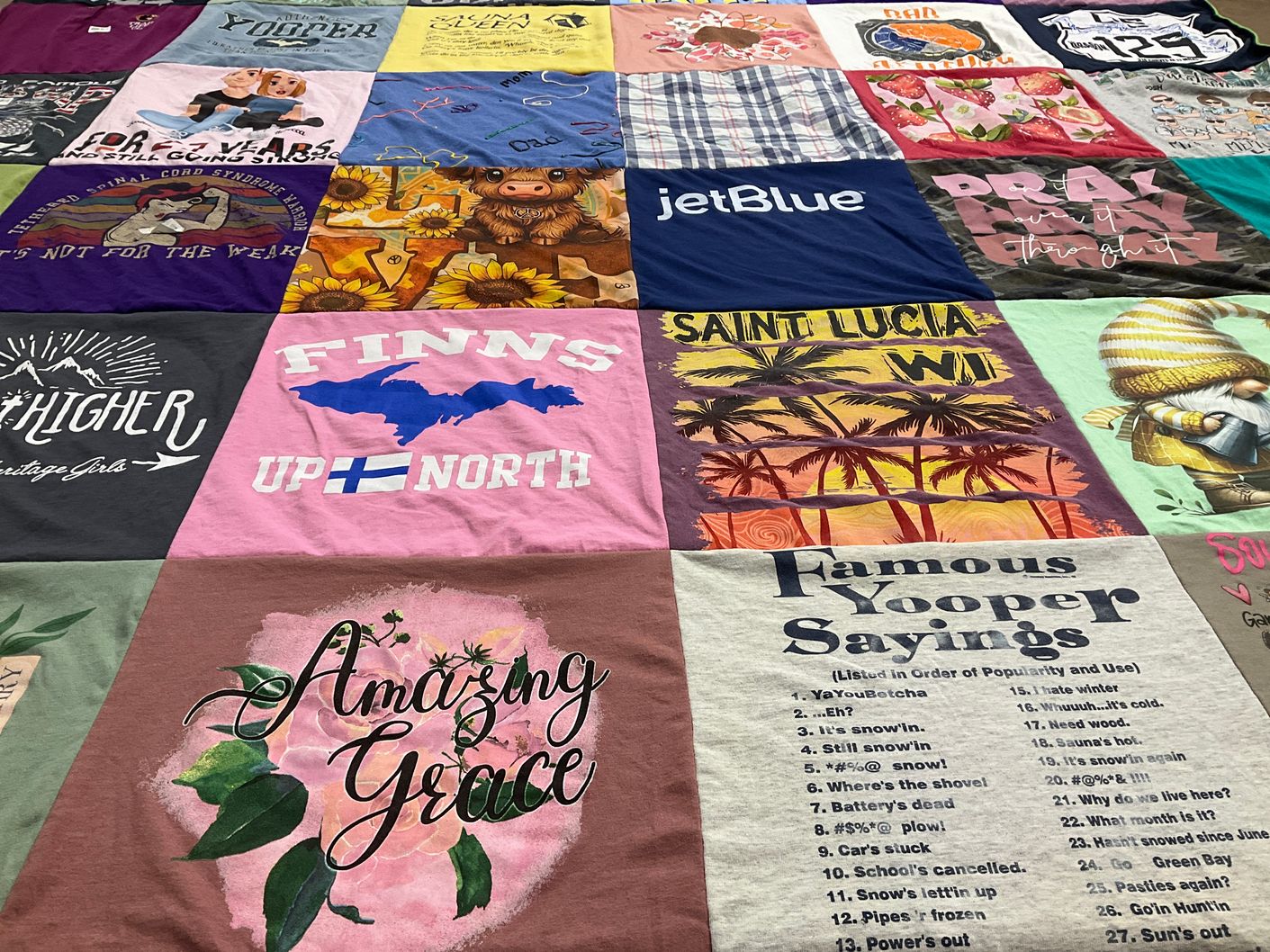 T-shirt quilt with travel, culture themes by Rebecca from SC