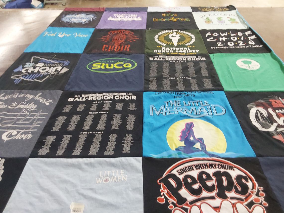 T-shirt quilt with music, theater themes by Rowena from TX