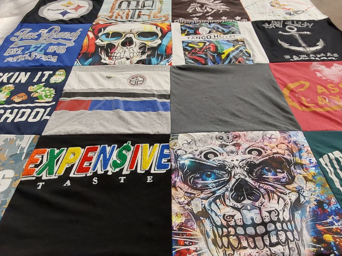 T-shirt quilt with music, gaming themes by Renee from GA