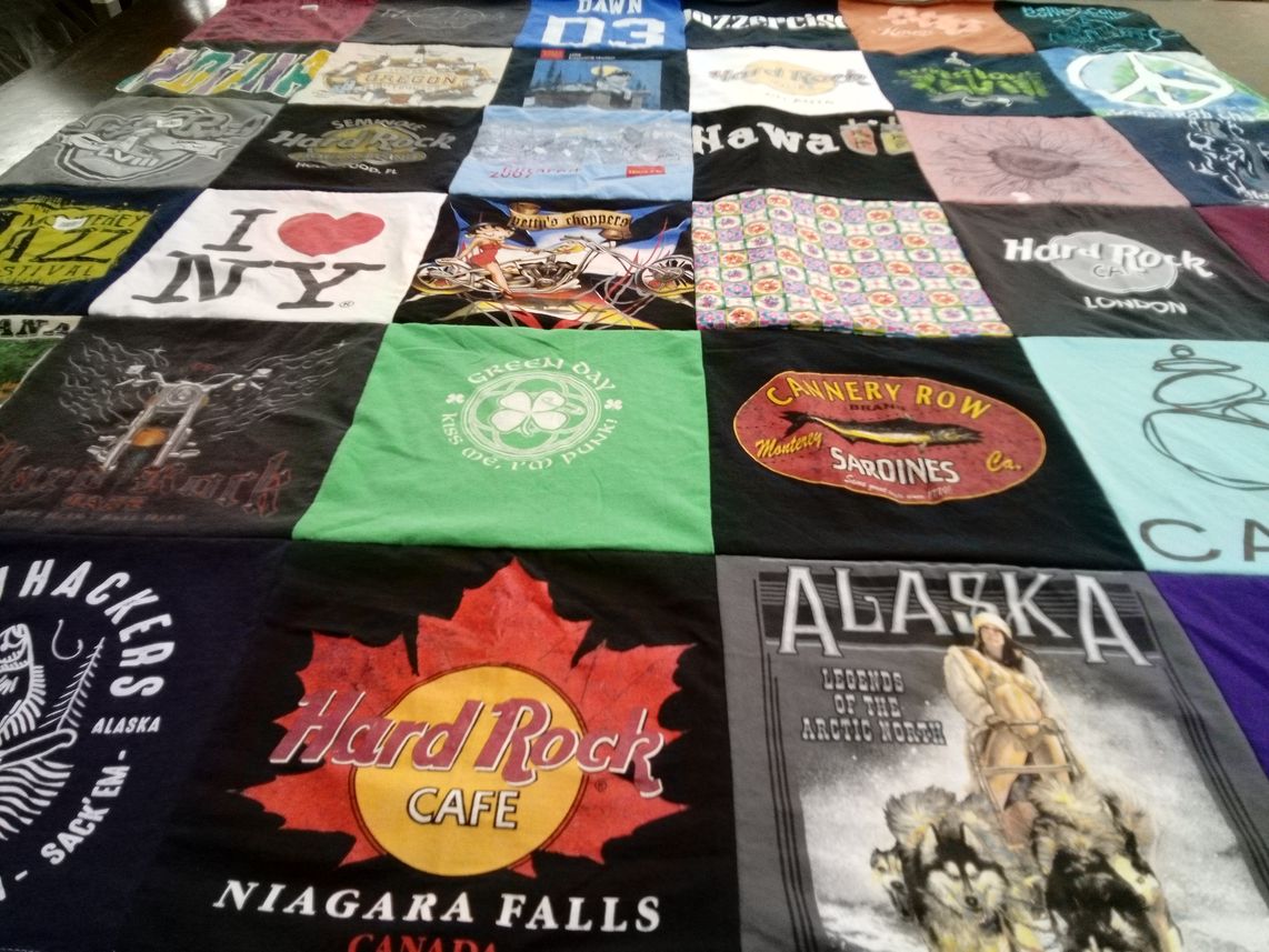 T-shirt quilt with music, travel themes by Dawn from AK