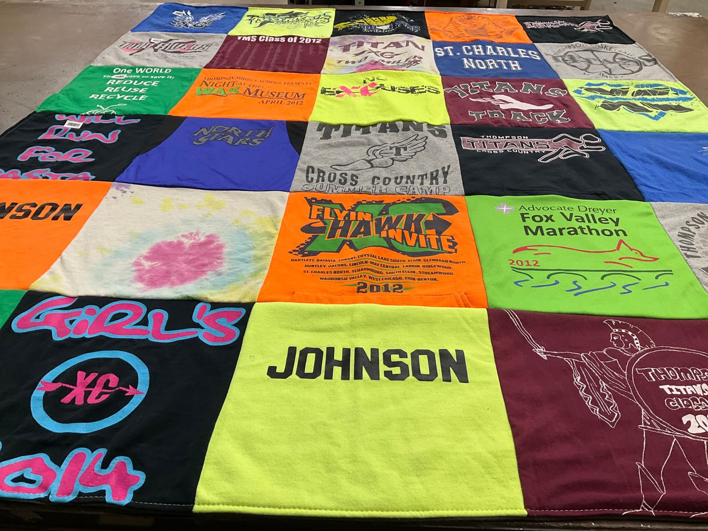 T-shirt quilt featuring thompson track and field, thompson cross country by Kirstin from IL