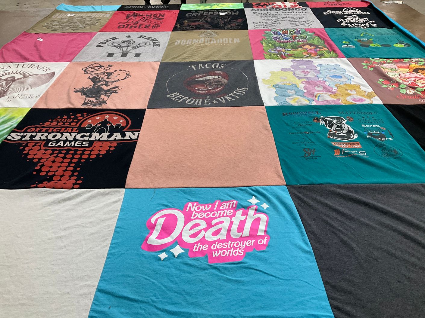 T-shirt quilt with fitness, gaming themes by Sarah from NC