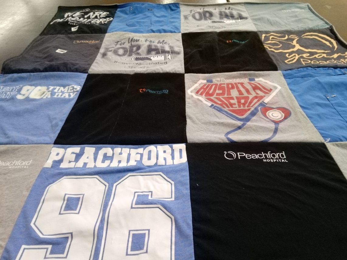 T-shirt quilt with healthcare themes by Amelia from GA