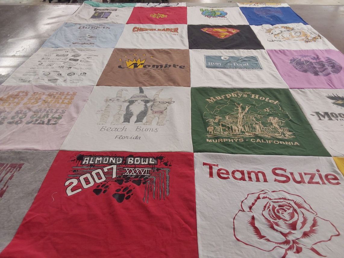 T-shirt quilt with food, events themes by Alexandra from CA