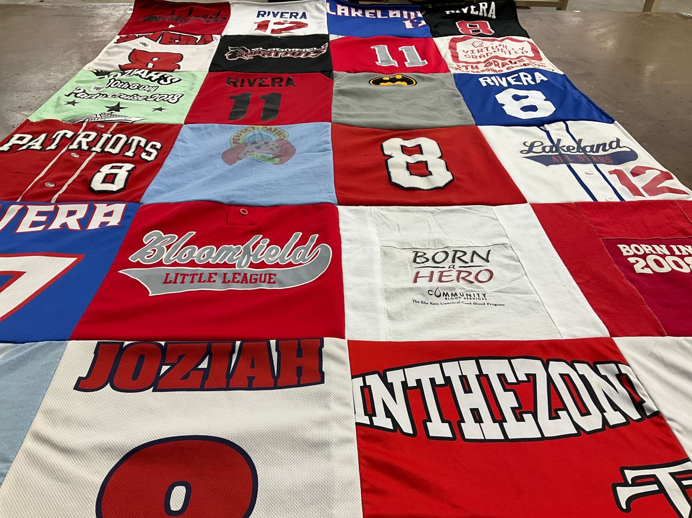 T-shirt quilt with sports, community service themes by Caraballo from NJ
