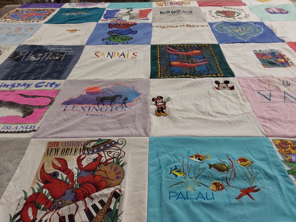 T-shirt quilt with travel, vacation themes by Kathleen from LA