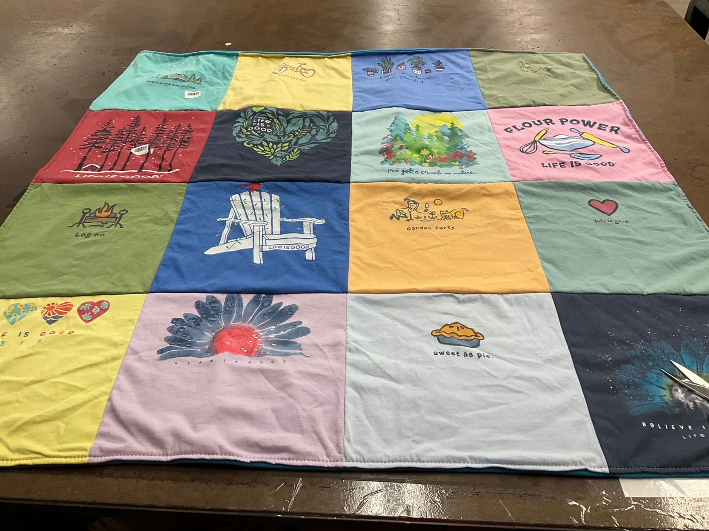 T-shirt quilt with outdoor activities, baking themes by Judith from SD