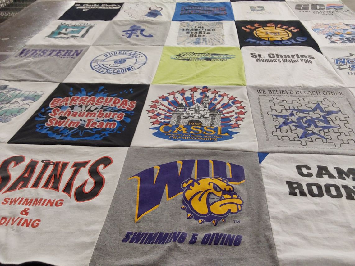 T-shirt quilt featuring schaumburg swim team, saints swimming and diving by Heidi from IL