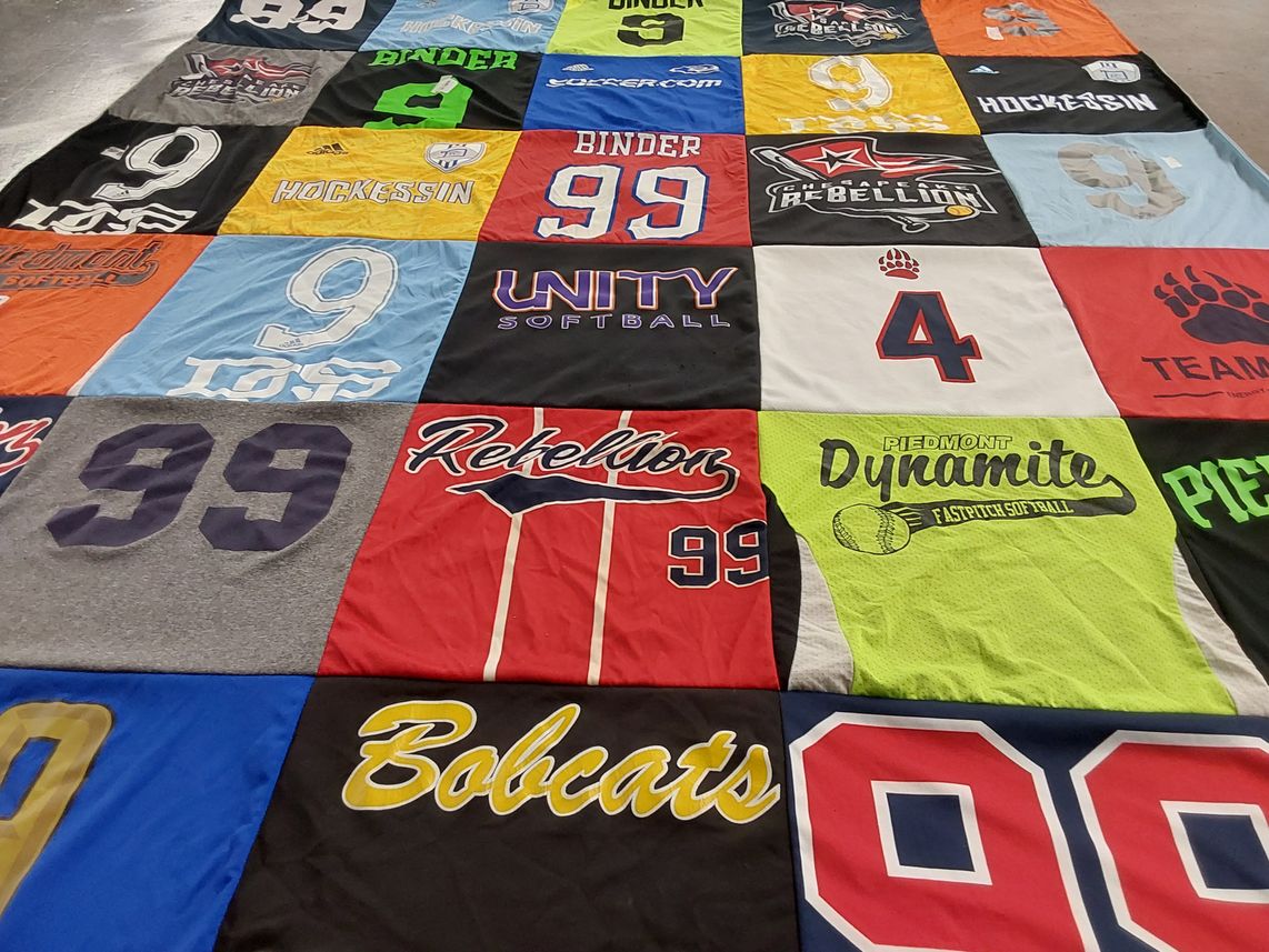 T-shirt quilt with softball, sports themes by Erin from VA