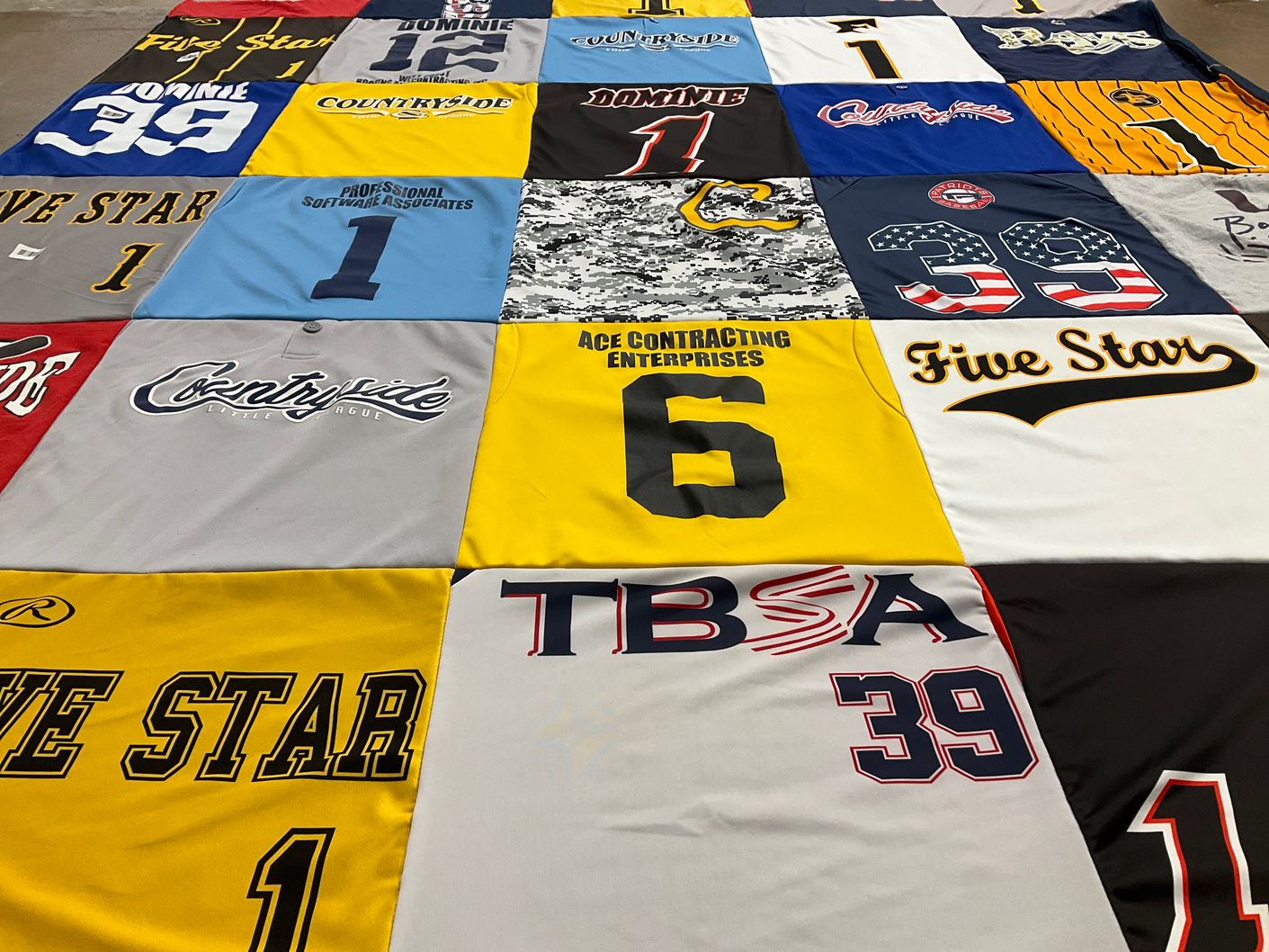 T-shirt quilt with softball, business themes by Heather from FL