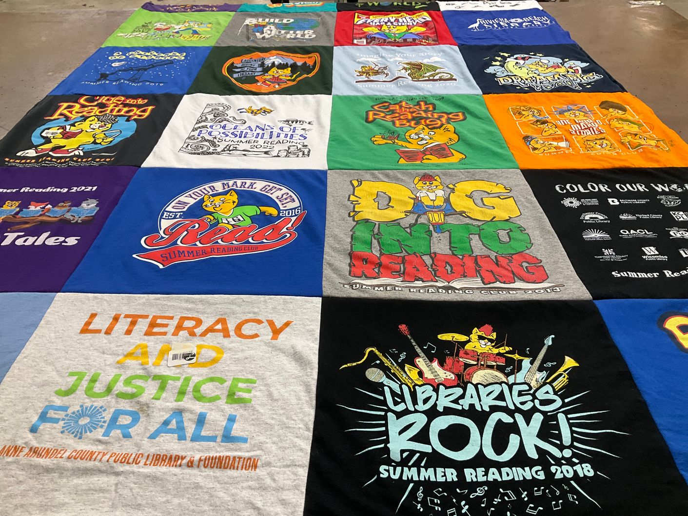 T-shirt quilt with literacy, education themes by Rebecca from MD