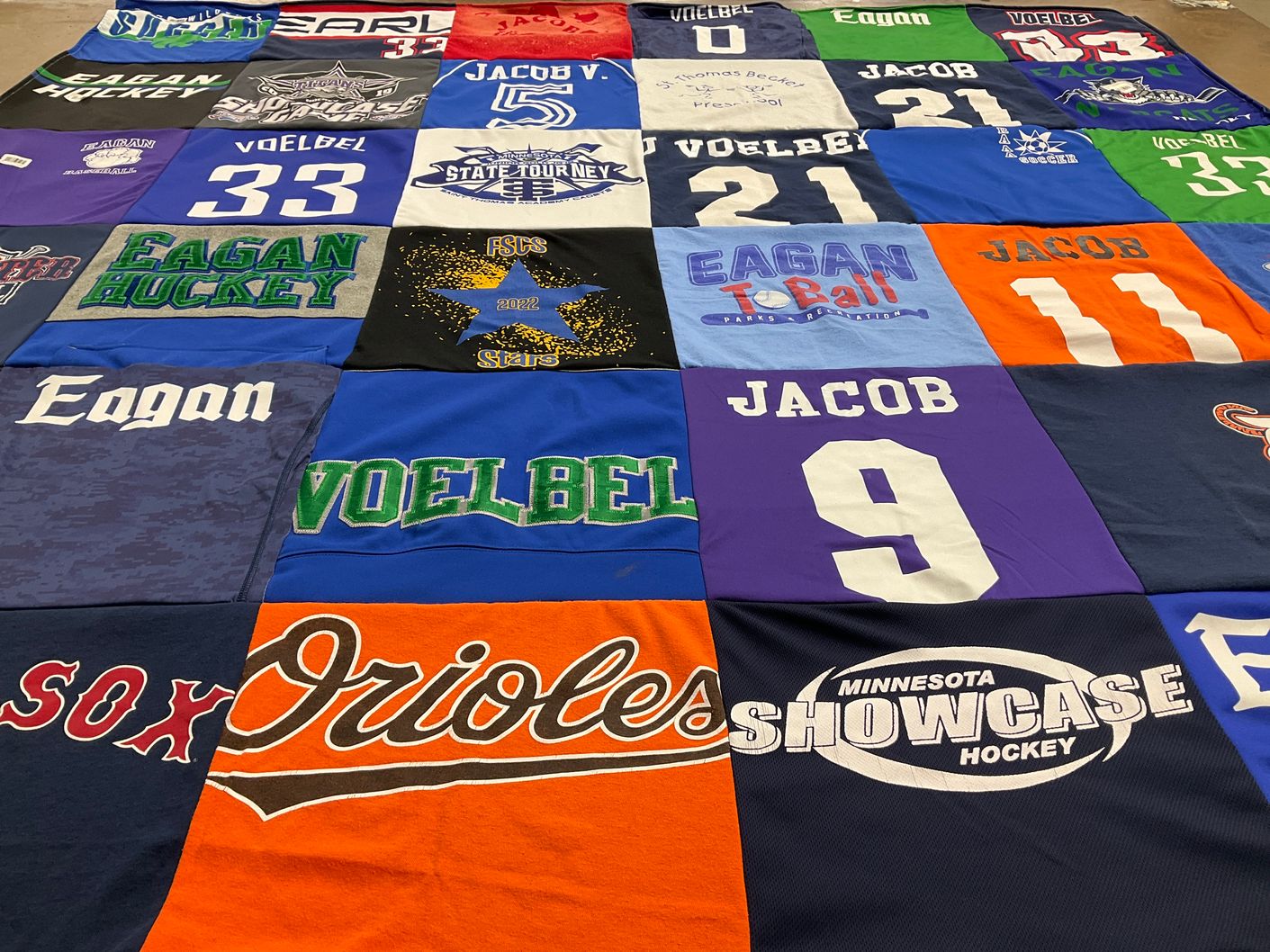 T-shirt quilt featuring eagan high school hockey by Rich from MN