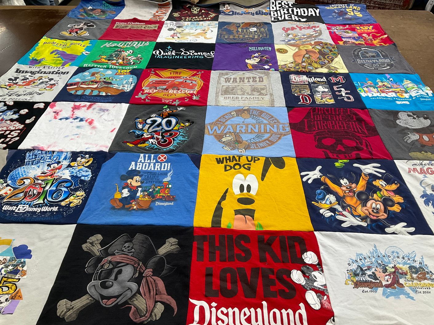 T-shirt quilt with disney, amusement parks themes by Bethany from CO