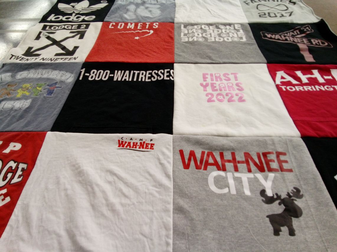 T-shirt quilt with camping, youth programs themes by Amy from NY