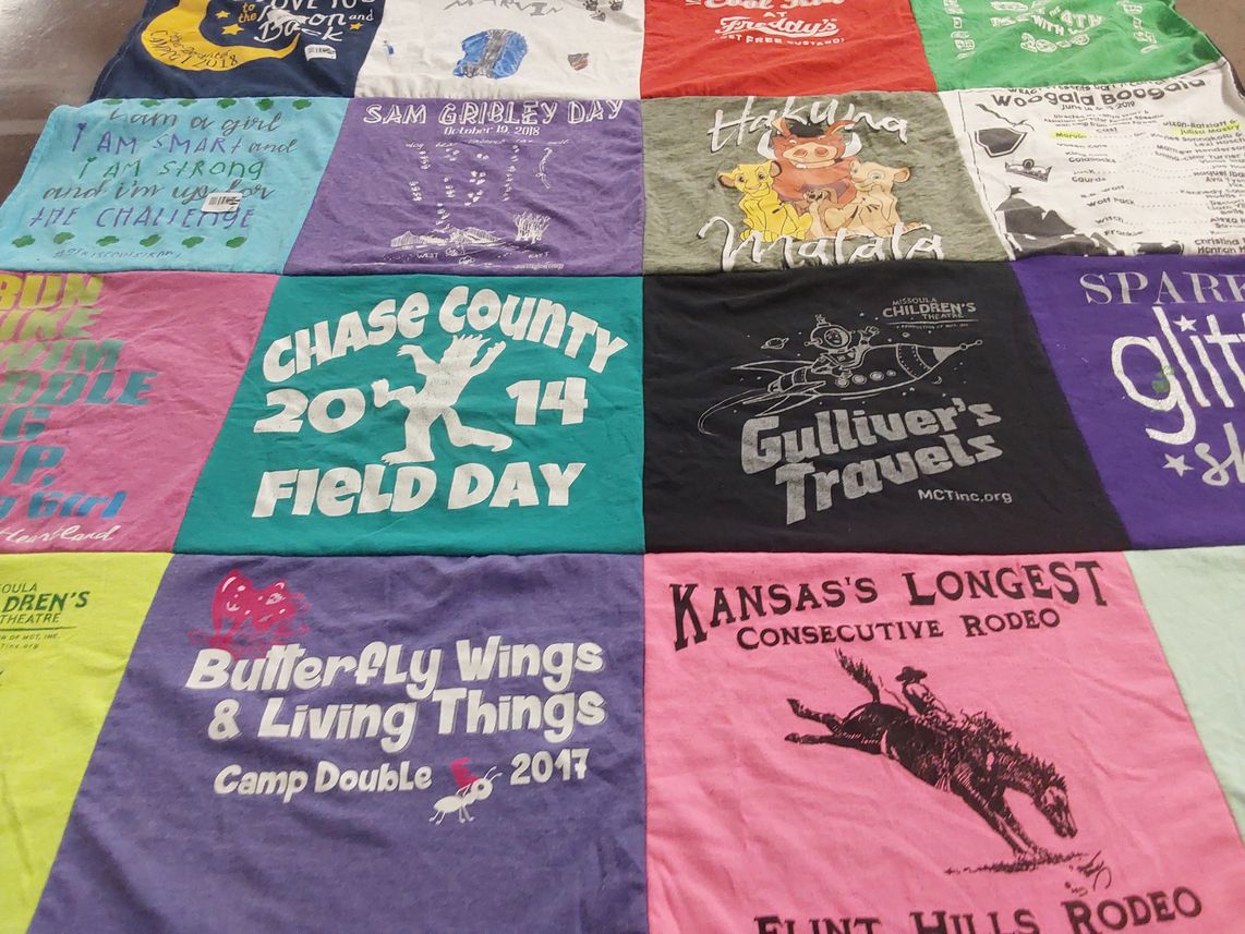 T-shirt quilt with children's theatre, outdoor activities themes by Jessica from KS