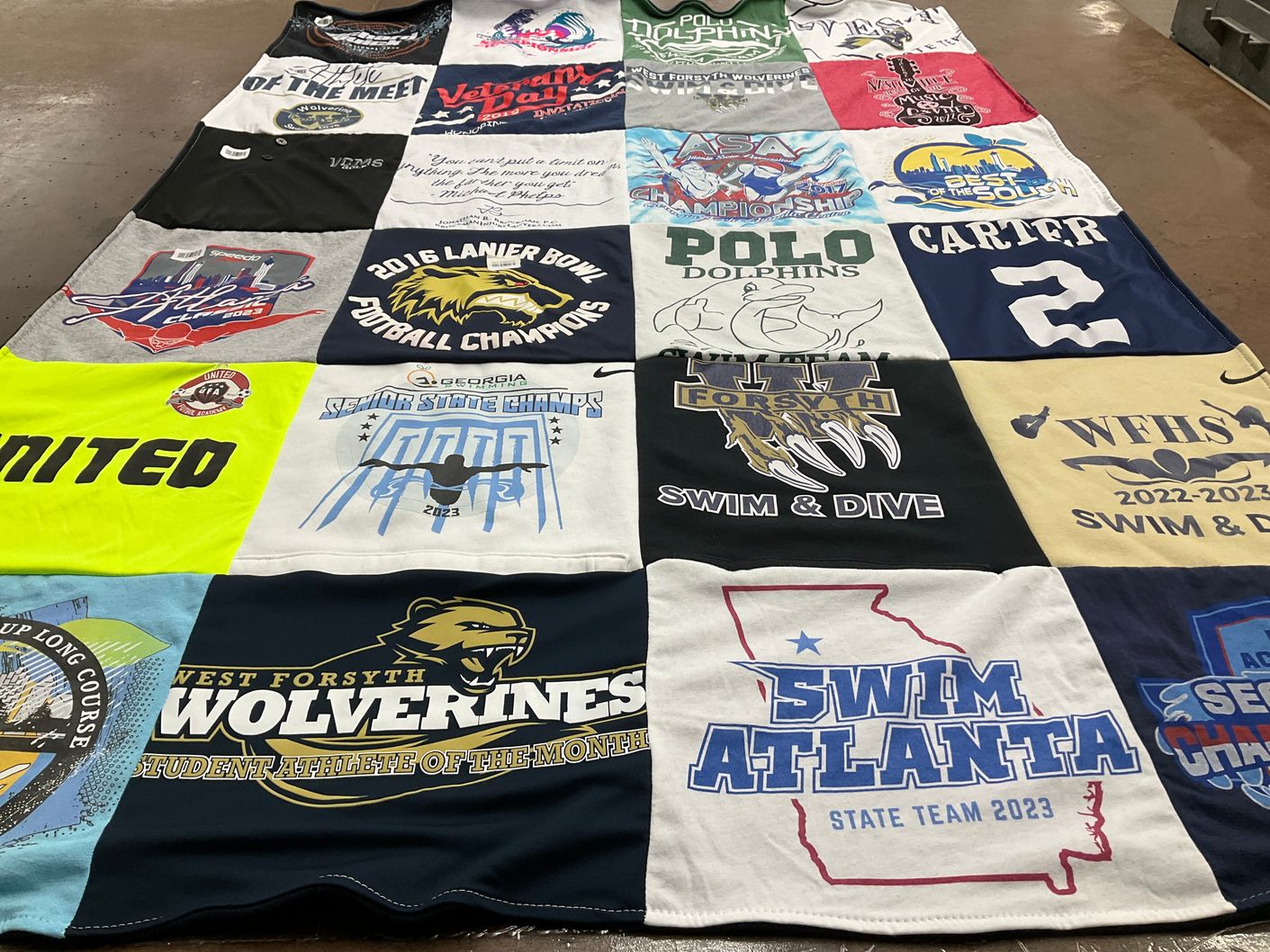 T-shirt quilt featuring polo dolphins, west forsyth high school swim and dive by Angela from GA