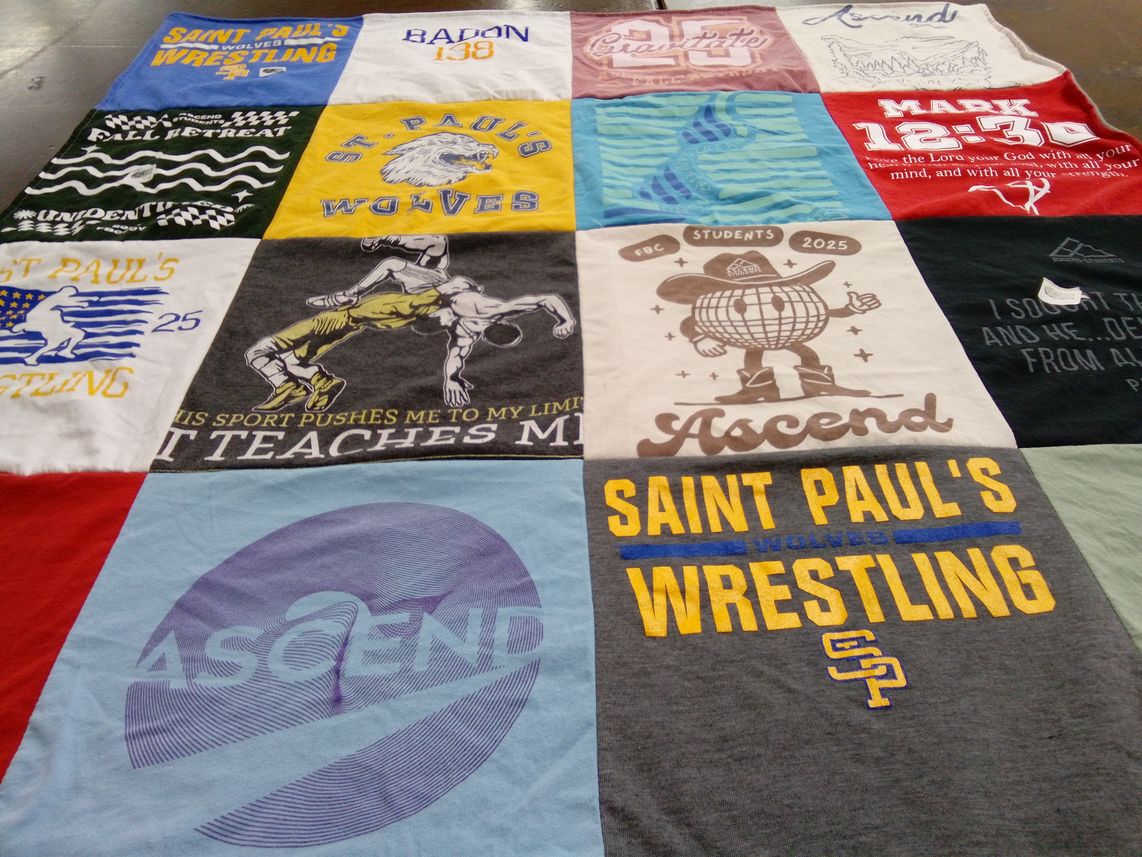 T-shirt quilt featuring saint paul's wolves wrestling by Gretchen from LA