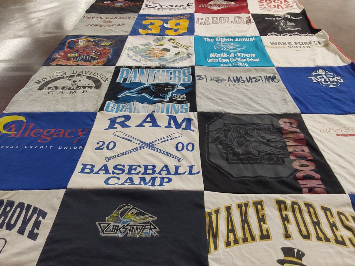 T-shirt quilt featuring south carolina gamecocks, carolina panthers by Kirsten from NC