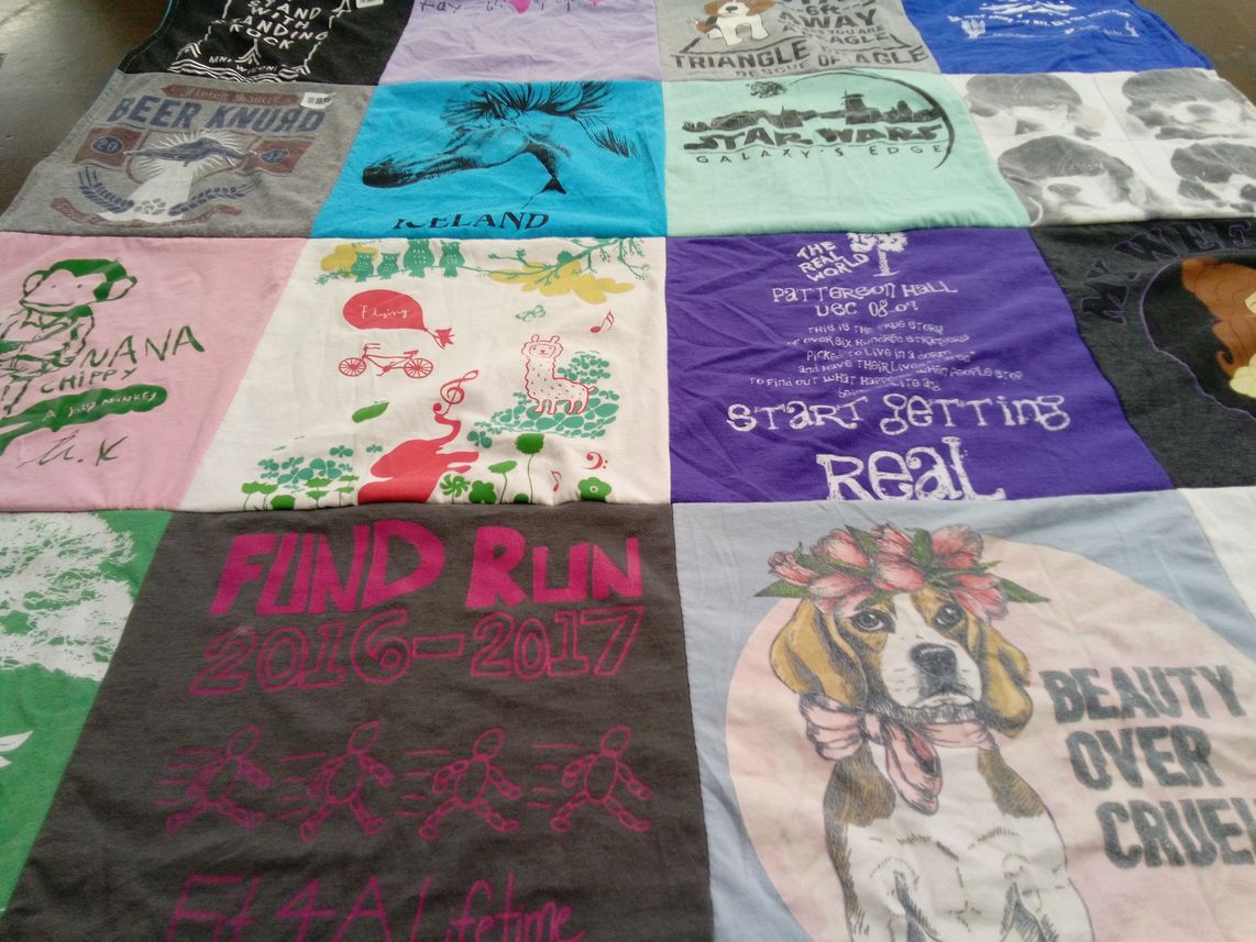 T-shirt quilt with animal welfare, running themes by Jessica from SC