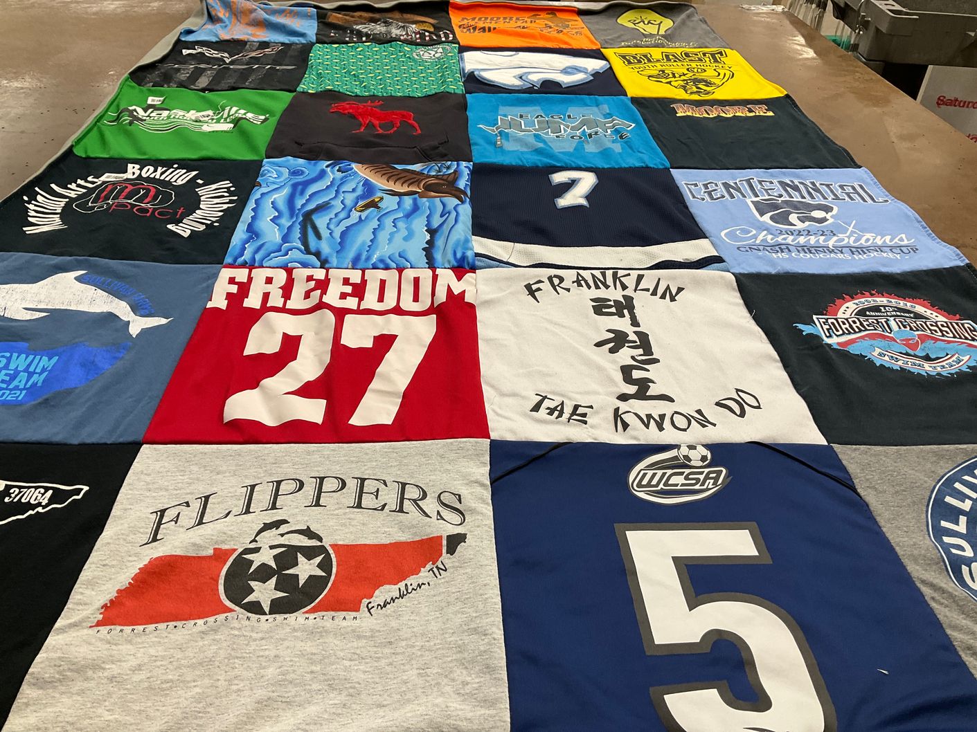 T-shirt quilt featuring franklin swim team by Carol from TN