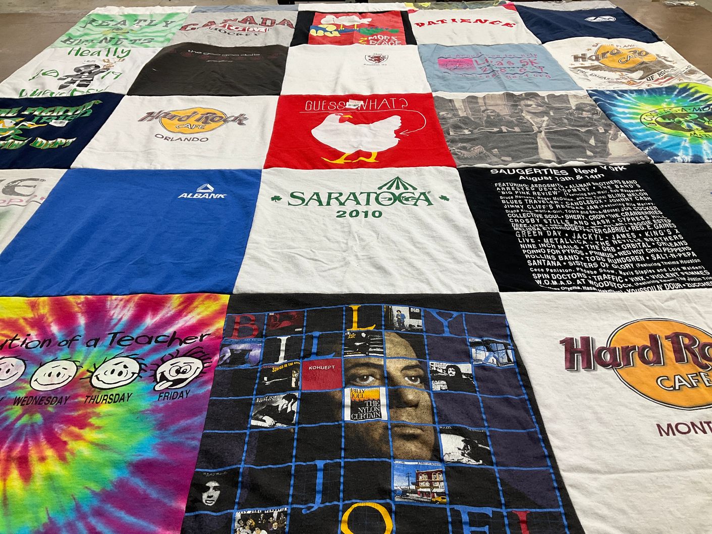 T-shirt quilt with music, travel themes by Patience from NY