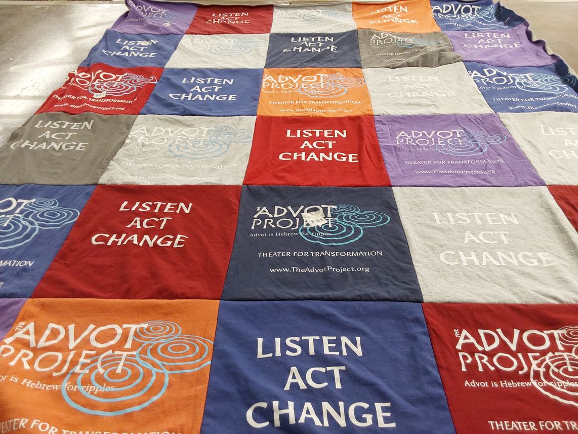 T-shirt quilt with theater, transformation themes by Naomi from CA