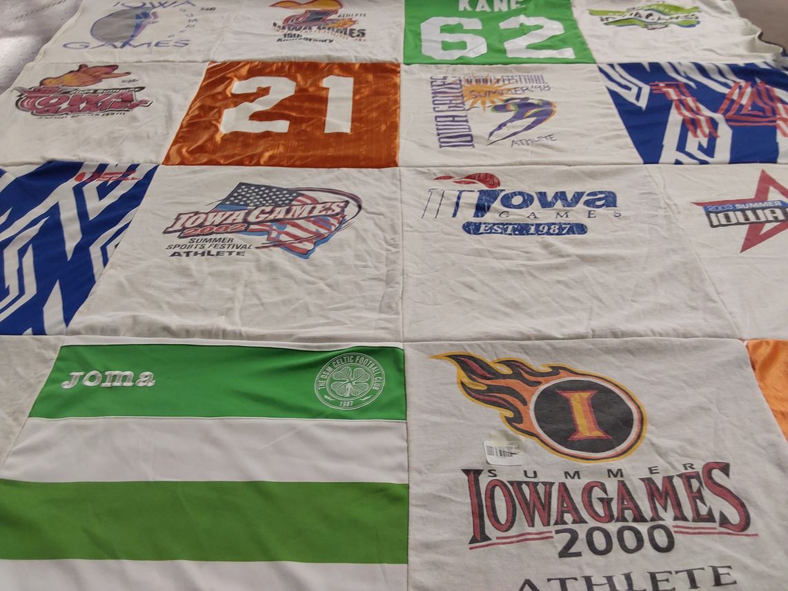 T-shirt quilt with sports, athletics themes by Michele from IA