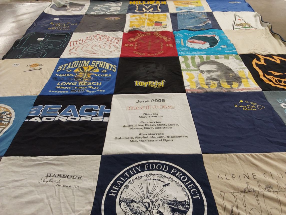 T-shirt quilt with sports, food themes by leisa from IL