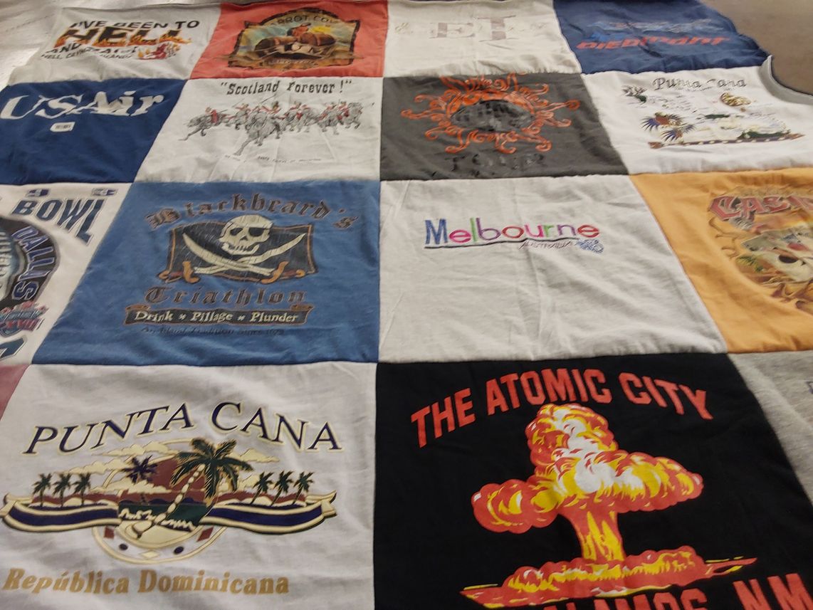 T-shirt quilt with travel, sports themes by Pat from VA