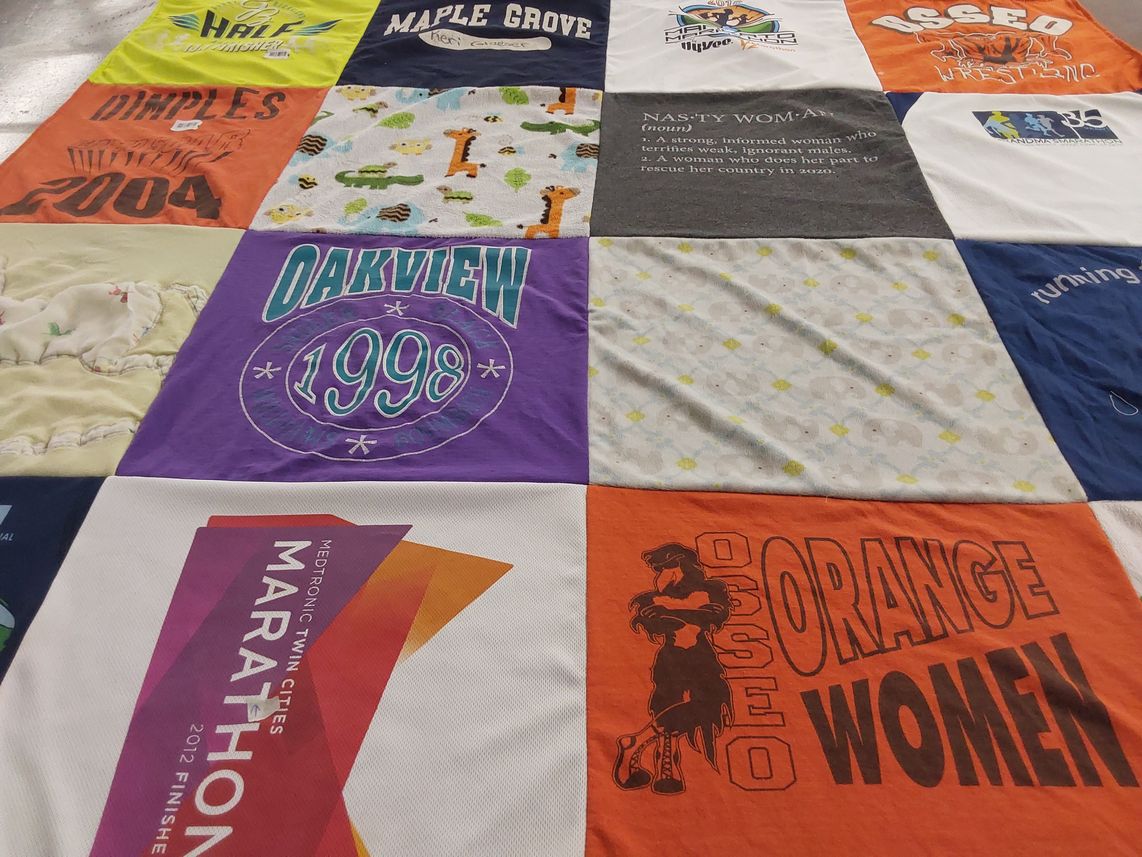 T-shirt quilt featuring osseo orange women by Keri from MN