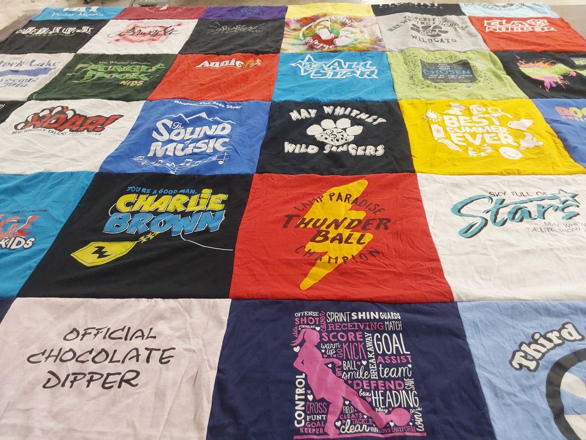 T-shirt quilt with theater, music themes by Amy from IL