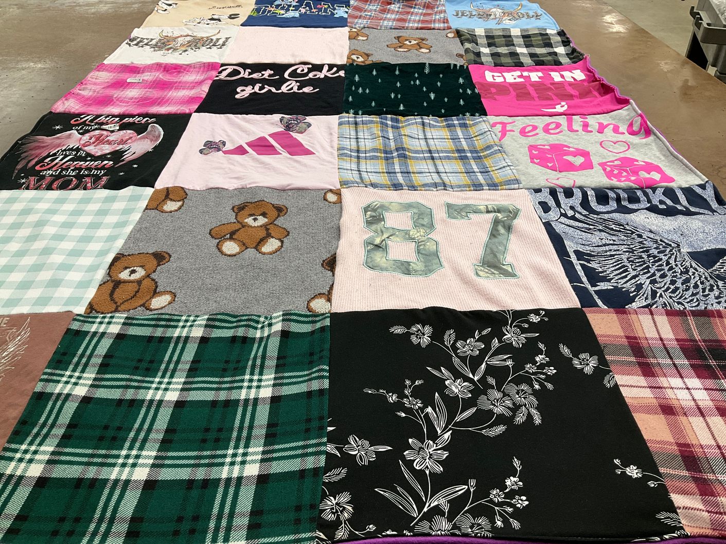 T-shirt quilt with fashion, pop culture themes by RaeJean from CO