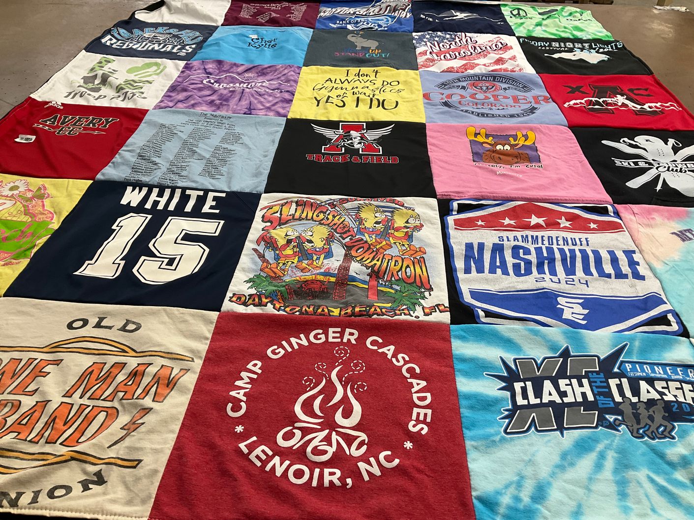 T-shirt quilt with camping, sports themes by Stephanie from NC