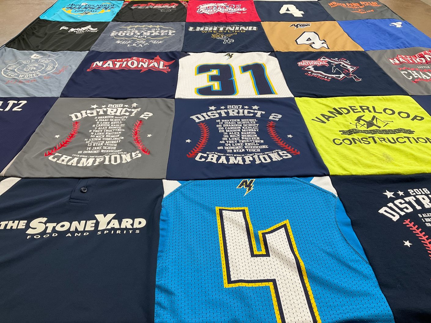 T-shirt quilt with softball, baseball themes by Jane from WI