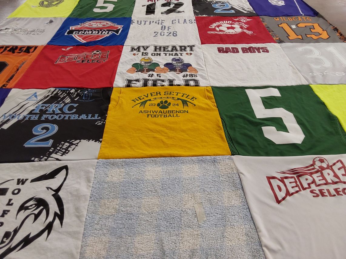 T-shirt quilt with football, youth sports themes by Deb from WI