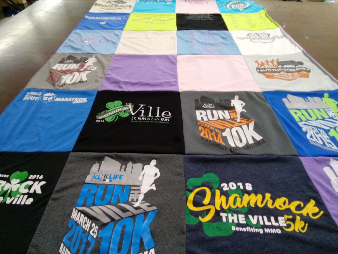 T-shirt quilt with running, charity themes by Harriot from IA