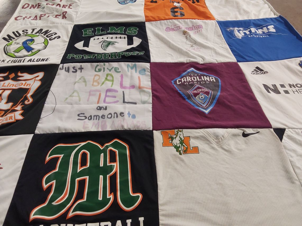 T-shirt quilt featuring carolina raids soccer team, mustangs soccer team by megan from NC