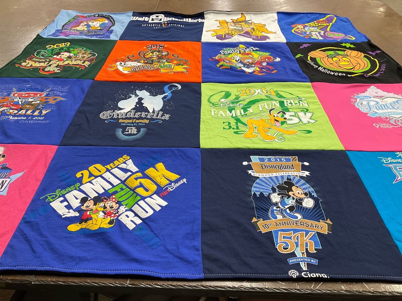 T-shirt quilt with disney, running themes by Hannah from IL