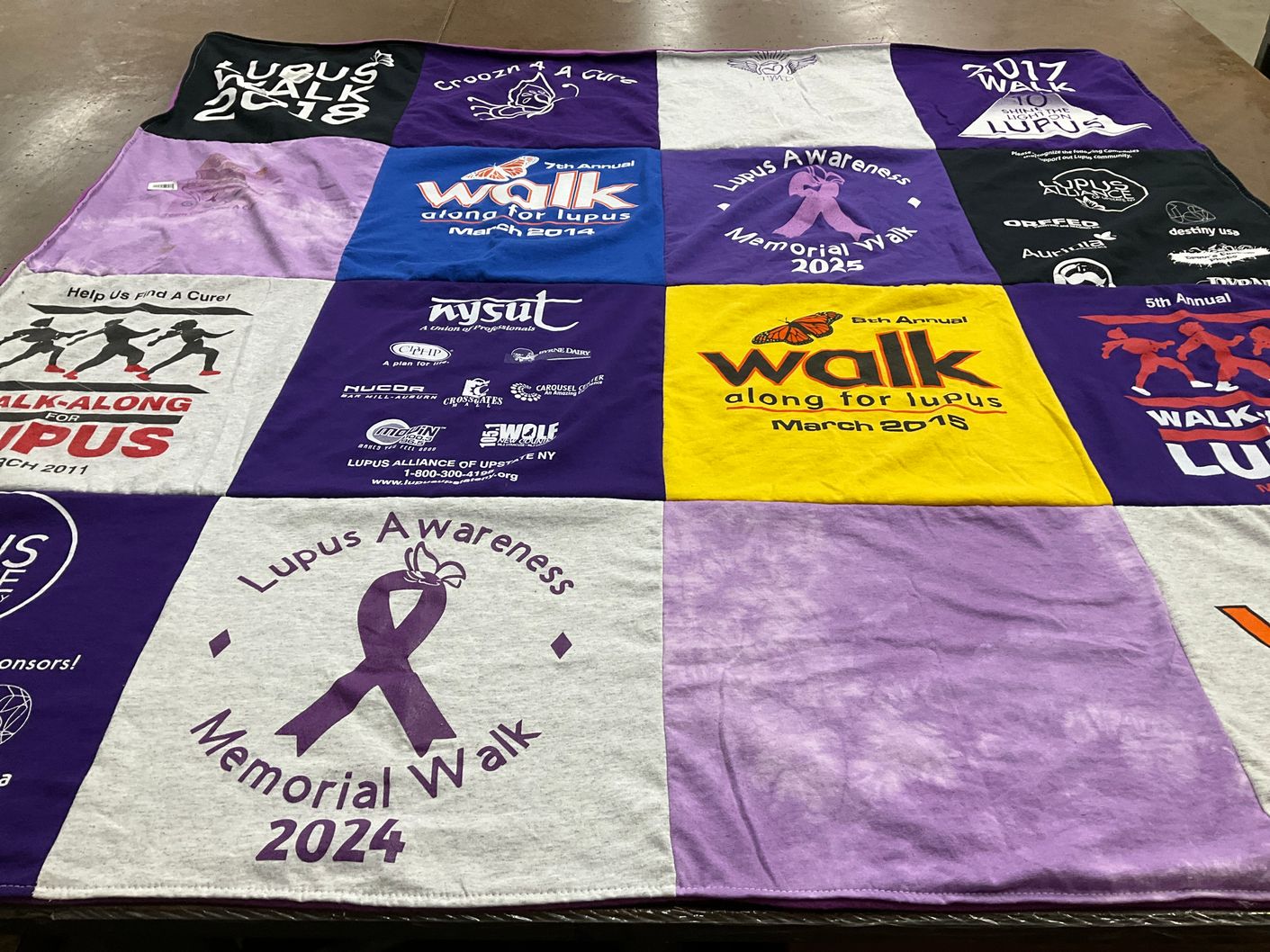 T-shirt quilt with lupus awareness, fundraising themes by Kathy from NY