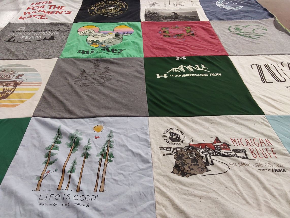 T-shirt quilt with outdoor, running themes by Betsy from OR