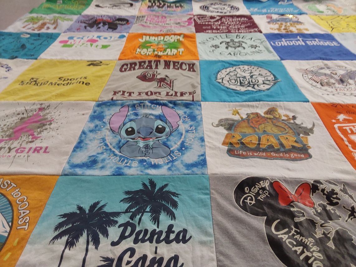 T-shirt quilt with travel, disney themes by Leah from VA