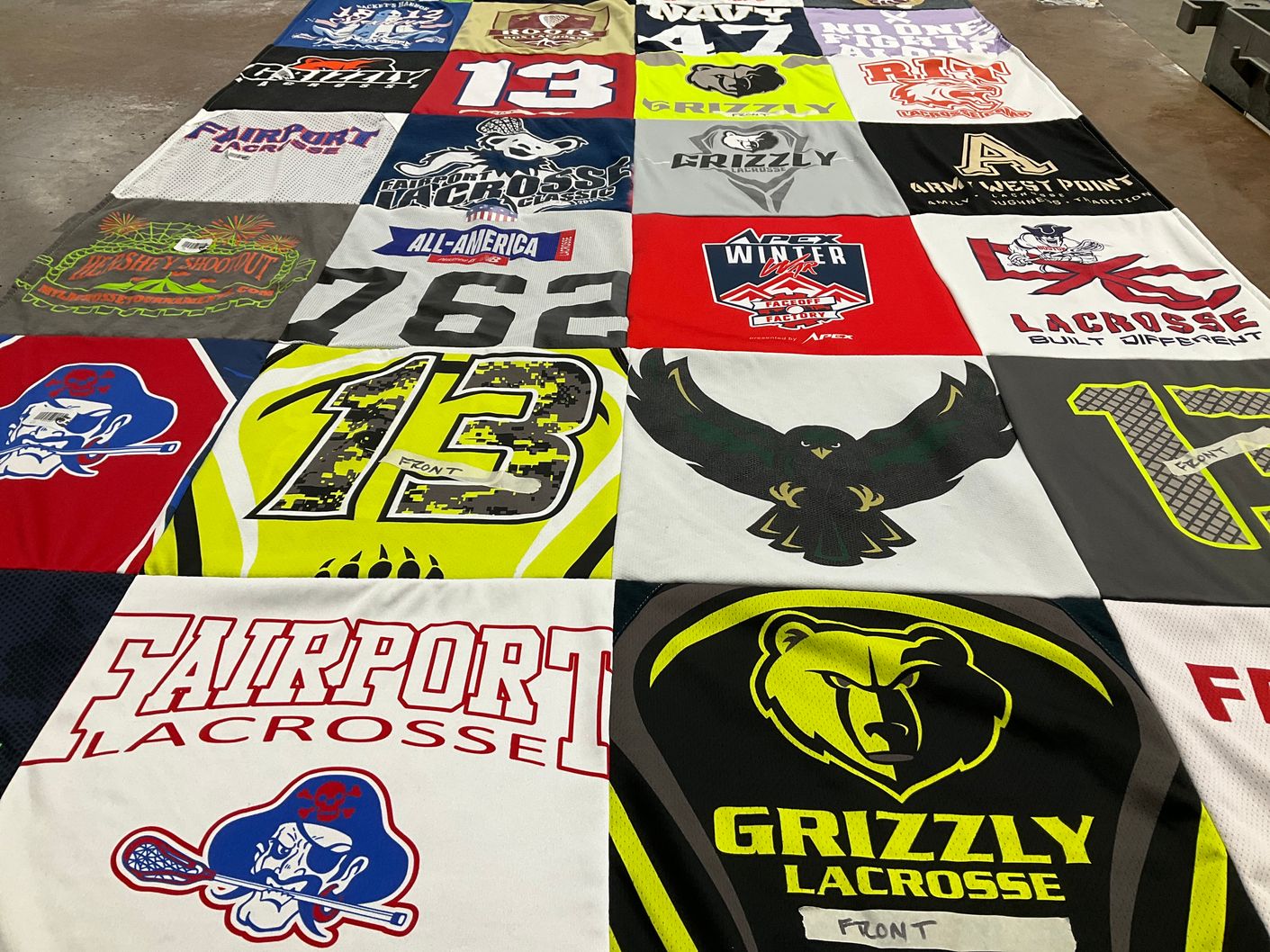 T-shirt quilt featuring grizzly lacrosse, navy lacrosse by Richard from NY