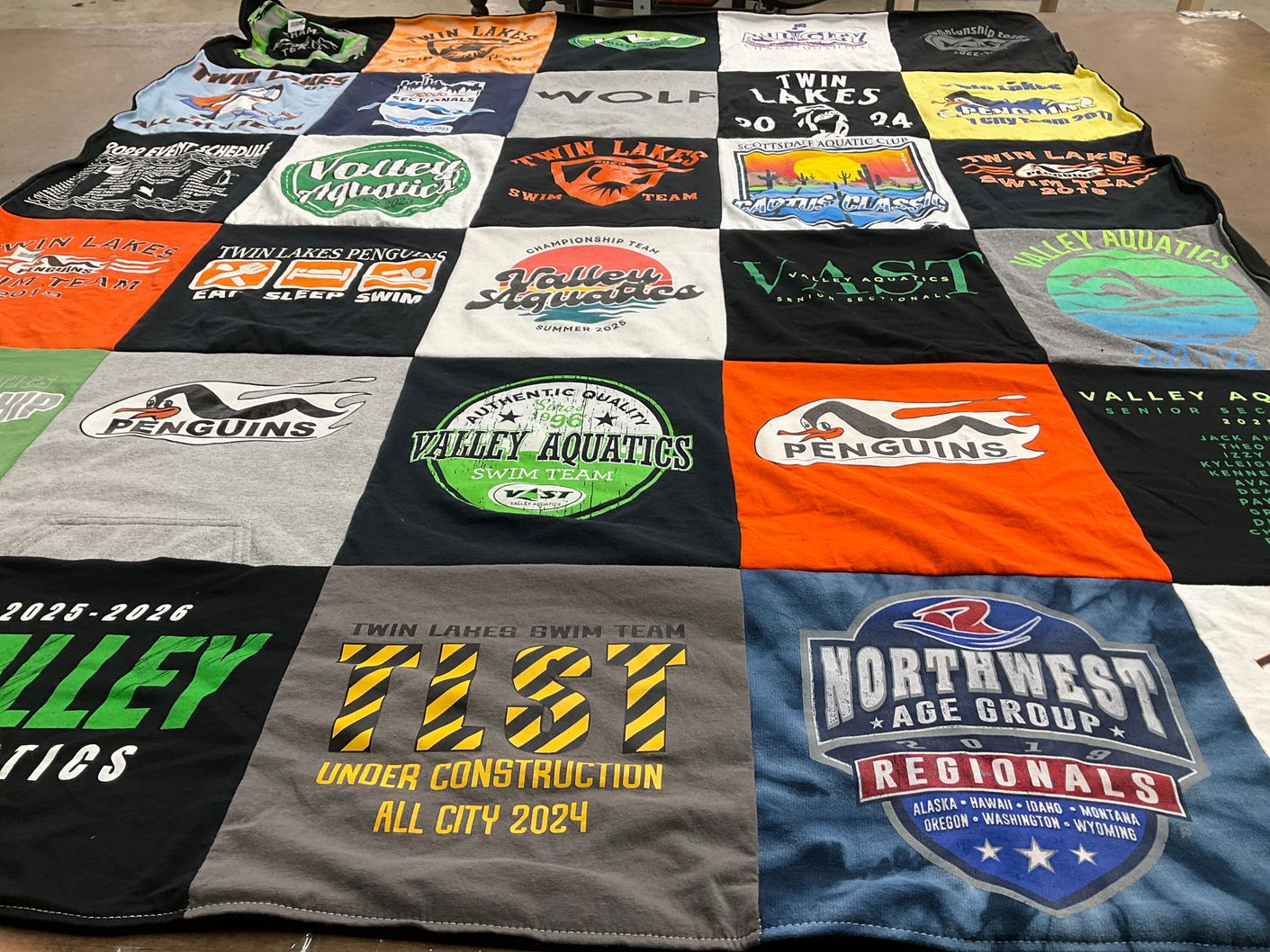 T-shirt quilt featuring twin lakes swim team, valley aquatics swim team by Melanie from WA