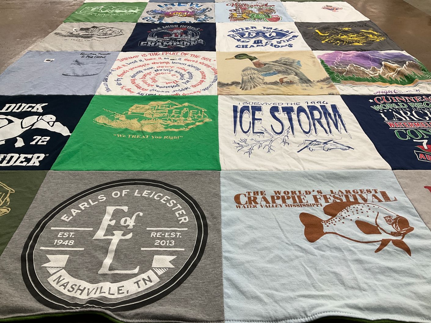 T-shirt quilt with fishing, hunting themes by Phyllis from MS