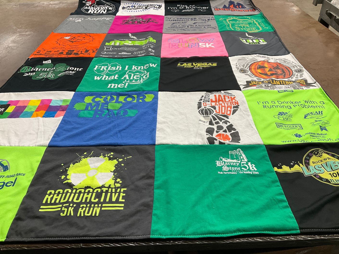 T-shirt quilt with running, events themes by Jean from CO