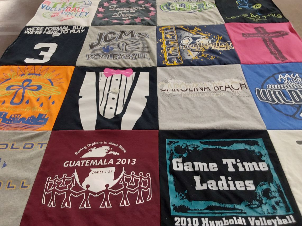T-shirt quilt with sports, volunteering themes by Robin from FL