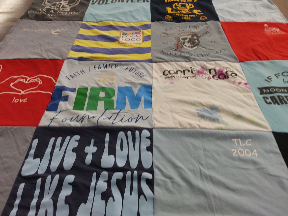 T-shirt quilt with volunteering, faith themes by Maia from MI