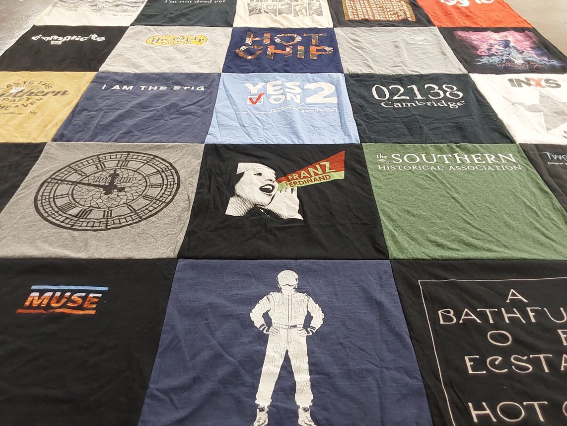 T-shirt quilt with music, history themes by Sally from MI
