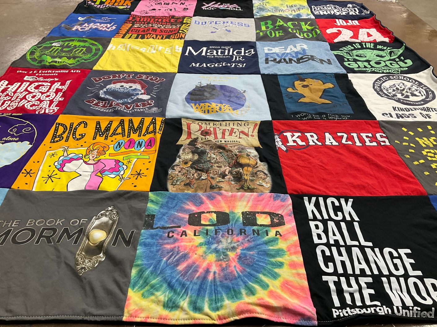 T-shirt quilt with theater, music themes by Josie from NY